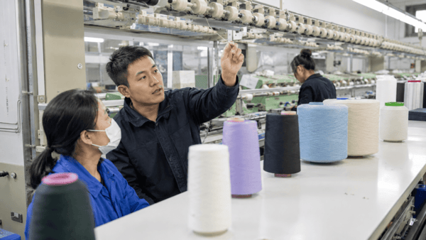 Textile machine inspection team during factory pre-audit
